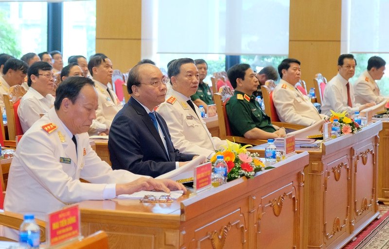 Thủ tướng Nguyễn Xuân Phúc dự hội nghị triển khai Nghị định 01 vào chiều 7/8. Ảnh: Quang Hiếu